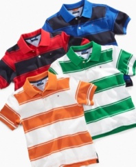 Wide stripes and bright colors make for a lively look he'll love on this Tommy Hilfiger polo shirt.