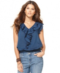 Romantic ruffles adorn the front and sleeves of this top from DKNY Jeans. Rendered from chambray cotton, it's essentially springy.