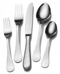 With a timeless silhouette and textured handles catching the light, the Continental Hammered flatware set from Wallace lends sheer brilliance to modern tables. Quality stainless steel place settings and serving pieces ready the host for every day and occasion.