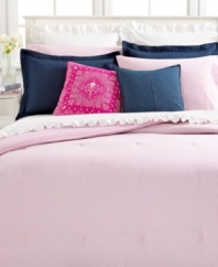Think pink. With classic pinstripes on one side and solid pink on the reverse, this pretty cotton comforter dresses your bed in two polished Lauren Ralph Lauren looks. Envelope closure.