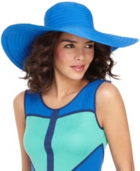 Channel vintage glamour with this classic floppy sun hat by August.