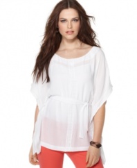 Channel the essence of bohemian style in this airy top by Kut from the Kloth. Semi-sheer fabric and lace trim lend a touch of romance to this easy staple!