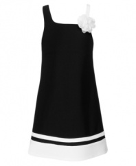 A classic twist. Fashionable black and white combine with contrast and flower detail for a frock from Sweet Heart Rose that has a timeless look and modern style.