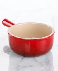 Crafted for durability and ease of use but with a brilliant enamel finish to redefine a table, this French onion soup bowl from Le Creuset's collection of serveware and serving dishes lends smart, enduring style to a culinary classic. Made to withstand the heat of a broiler, it's perfect for creating a lid of bubbling hot cheese.