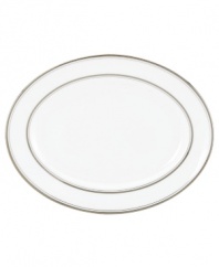 Set the table with poise and purpose. The Library Lane collection features tailored platinum bands on white china that bring black tie elegance to any meal. Oval platter not shown.