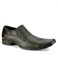 A handsome casual pair of men's dress shoes with the bold attitude of a boot, this square-toed loafer is crafted in quality distressed leather. Imported.