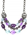 Front and center! All eyes will be on you in this fashion-forward frontal necklace from Jones New York. Featuring a three-row silhouette with beautiful multicolored beading, it's made in hematite tone mixed metal. Approximate length: 17 inches + 2-inch extender. Approximate drop: 3 inches.