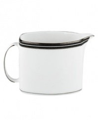 In the hands of kate spade, black and white is anything but basic. Dancing ebony stitched stripes provide a stunning contrast to the pristine china of the Union Street creamer (shown front right).