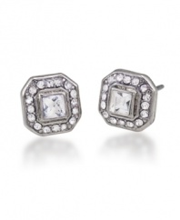 Art Deco appeal. Carolee's distinctive button earrings convey vintage inspiration. Crafted in silver tone mixed metal and embellished with sparkling glass accents, they're equally elegant for daytime or evening. Approximate diameter: 3/8 inch.