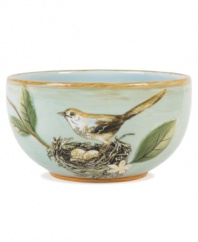 A charming part of any casual landscape, this fanciful Toulouse bowl from Fitz and Floyd is brimming with life, from its sculpted botanicals and twig edge to a full bird's nest.