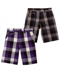 Polished in plaid. These comfortable chino shorts from Nike will give any outfit a sporty, clean-cut feel.