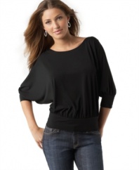 Studio M updates the basic knit top with a chic dolman sleeve and trendy banded hem.