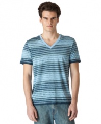 Ditch the crew-neck and get hip to the streetwear styling of this striped V-neck from Calvin Klein Jeans.