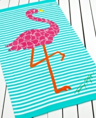 A vibrant pink flamingo with floral embellishments steals the show in this Tommy Hilfiger beach towel. Finished with a ground of serene aqua and white stripes and the Tommy Hilfiger signature.