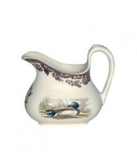 Bring the classic style of the English countryside to your table with the Woodland Collection by Spode. This traditionally patterned creamer features the majestic mallard duck framed by Spode's distinctive British Flowers border which dates back to 1828. Holds 9 ounces.