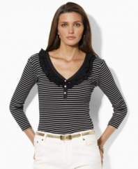 Lending flirty appeal to a season essential, delicate ruffles and three-quarter sleeves update the chic Lauren by Ralph Lauren top in breathable ribbed-knit cotton.