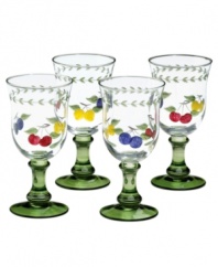 Lemons, cherries and plums add a splash of summery cheer to already-irresistible water goblets. Hand painted and etched, with a leaf garland and pine-green base, this set of Villeroy & Boch drinking glasses brings colorful refreshment to casual country kitchens.