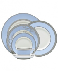 Set your table with fresh garden elegance. A lovely piece for coordinating with the Lace dinnerware, this rim soup plate features a distinctive platinum pattern accented with colors inspired by Vera Wang's latest bridal collection.