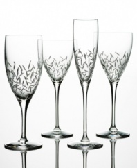 Dotted with small vertical cuts along the classically-styled bowl, kate spade's Beacon Street stemware is a perfect example of the chic sophistication the renowned designer is known for. Shown far left.