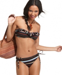 Make an impression at the beach! Roxy's brief bottom rocks a trendy tribal print and sexy side ties.
