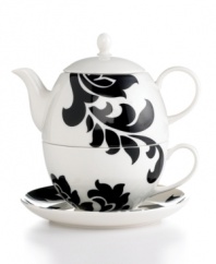 Bold design and uncompromising quality make this Lisbon tea set a real charmer. Featuring stenciled black florals on a stackable teapot, teacup and saucer for one from Martha Stewart Collection.