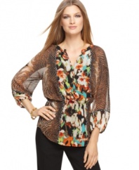 Contrasting mixed prints add a bit of a boho flair to this Calvin Klein chiffon blouse -- perfect for adding color to a winter wardrobe!