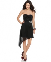 BCX's little black dress is designed with a lot of extras: It's dressed up with a ruched bodice, beaded hip, and graceful, asymmetrically hemmed skirt with a sheer overlay.