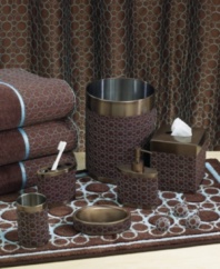 Wrapped in mocha faux leather and stitched with a contemporary circle pattern, this lotion or liquid soap pump is all-around chic. Metal with a rich copper hue adds another element of sophistication to your bathroom decor.