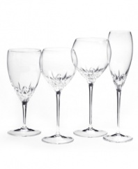 Inspired by the chic London neighborhood, Wedgwood Knightsbridge stemware features a delicately round shape with deep cuts around the bowl. The stem resembles a flower when viewed from above. Iced beverage shown far left.