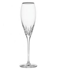 Inspired by the chic London neighborhood, Wedgwood Knightsbridge stemware features a delicately round shape with deep cuts around the bowl, accented with a platinum rim. The stem resembles a flower when viewed from above. Flute shown far right.