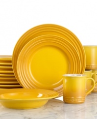 The dinnerware set that has it all. Crafted for durability and ease of use but with a brilliant enamel finish to redefine the table, Le Creuset place settings lend smart, enduring style to everyday dining. Featuring a three-ring design in mustard yellow.