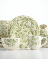 Update your table with the old-world charm of Floral Damask dinnerware by Gibson. Service for four draped in sage-green blooms offers effortless grace at every meal.