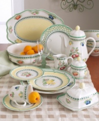 Bring the lush bounty of the French countryside to your table with this vibrant mix-and-match dinnerware and dishes collection from Villeroy & Boch. The scalloped French Garden dinner plates are available in four complementary patterns. The Fleurence pattern has a pale yellow center encircled with a garland of summer fruits. The Valence pattern has a yellow rim that surrounds a painted apple in the center. The Orange pattern features a green and yellow trellis on the rim while the Vienne pattern is white with a yellow rim that's framed by green edging and the recurring leaf garland.