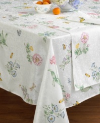 Add an air of springtime to your table with a motif of delicate flowers atop a latticework of greenery. In a soft, durable cotton blend.