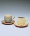 Warm, natural colors and a retro feel combine in this simple, curved mug. From Denby's dinnerware and dishes collection.