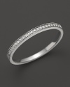 Diamonds in a 14K white gold band.