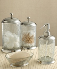 Store your favorite products in the sleekly mod Crackle Glass jar. Crackle glass creates a refined texture and look while brass-based metal with a shiny nickel finish creates clean lines.