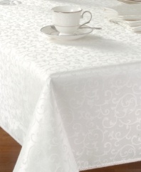 An evening of at-home fine dining is yours with Lenox's Opal Innocence tablecloth. The pattern's trademark white-on-white vine motif shimmers via contrasting luster. A corded rib on the edges of the tablecloth lends interest.