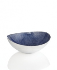 Full of surprises, this handcrafted bowl features sleek, polished aluminum lined with lustrous blue enamel. It's a striking home accent no matter what's on your menu. From the Simply Designz serveware and serving dishes collection.