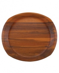 Less is more with Dansk wood serveware. A round surface takes shape in a subtly squared tray for carrying any number of foods. The contemporary look and rich wood grain combine for endless casual appeal.