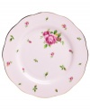 Revive a classic dinnerware pattern with the Vintage salad plate. Lush blossoms plucked from Royal Doulton's Old Country Roses collection flower on pink bone china with a ruffled gold edge.