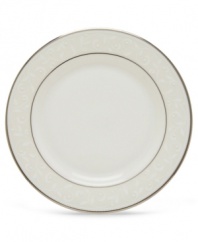 Pure opulence. Posh opalescence. This classically designed line of Lenox dinnerware and dishes is accented by a platinum rim and a delicate flourish of vine-like, white-on-white imprints with raised, iridescent enamel dots. Great gift for a housewarming, wedding or yourself. Bread and butter plate shown top right. Qualifies for Rebate