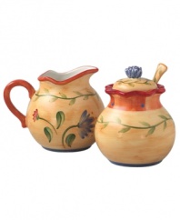 With a Tuscan-inspired pattern in warm, sun-drenched colors, this sugar and creamer set evokes cozy, casual meals in the Italian countryside. Sugar spoon fits beautifully between the bowl's notched lid and scalloped rim. From Pfaltzgraff's collection of dinnerware and dishes.