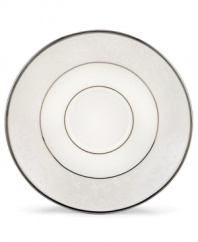 Pure opulence. Posh opalescence. This classically designed line of Lenox dinnerware and dishes is accented by a platinum rim and a delicate flourish of vine-like, white-on-white imprints with raised, iridescent enamel dots. Great gift for a housewarming, wedding or yourself. Qualifies for Rebate