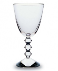 The Vega collection of wine glasses will make a unique and striking addition to your finely set table. Each piece features a neck lined with thick connecting diamond-shaped glass studs leading from the commanding sturdy base to the simple bulb, lending a look that has the timeless effect and appeal of glittering diamonds.