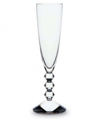 The Vega Stemware Collection will make a unique and striking addition to your finely set table. Each piece features a neck lined with thick connecting diamond-shaped glass studs leading fron the commanding sturdy base to the simple bulb, lending a look that has the timeless effect and appeal of glittering diamonds.