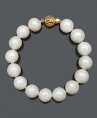 Refine your look with simple and sophisticated pearls. Bracelet features A+ cultured freshwater pearls (11-13 mm) with an ornate 14k gold circular clasp. Approximate length: 7-1/2 inches.