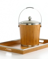 Modern style and ancient materials collide in this slick bamboo ice bucket. A silvertone metal lid and insulated design keep it cool when you're entertaining a crowd. (Clearance)