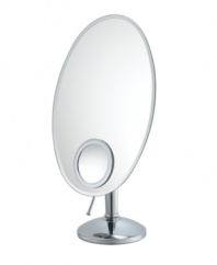 Focus up. Featuring an elegant oval shape and 10x magnifying inset, this vanity makeup mirror offers two views in one sophisticated design. Adjustable.