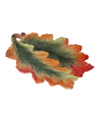 Ready your table for the harvest season. Glazed in the most glorious shades of fall, this figural leaf plate from Spode's collection of serveware and serving dishes is a beautiful addition to autumnal feasts and fresh companion to its classic Woodland dinnerware collection. (Clearance)